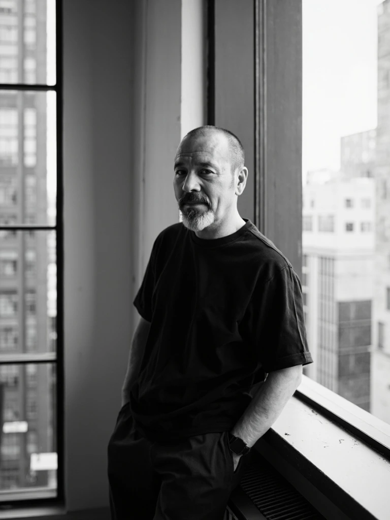 Portrait of Hiroshi Sato, Partner.